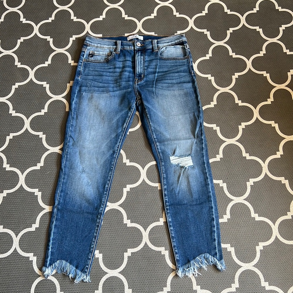KanCan distressed ankle length skinny jeans.